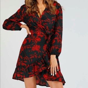 Black and red faux wrap dress.